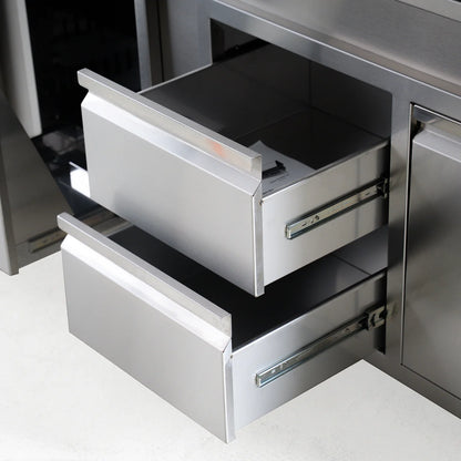 Stainless steel kitchen drawers with a modern design.