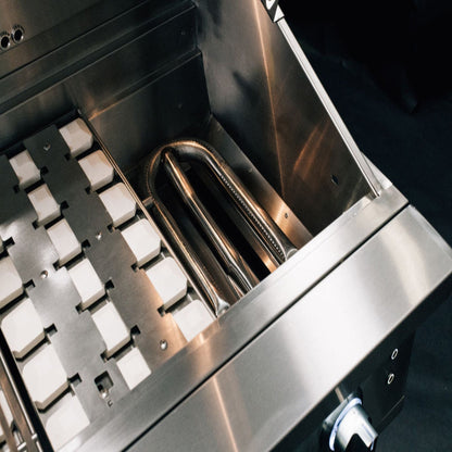 Summerset Quest grill interior showing ceramic briquettes and stainless steel U-tube burner