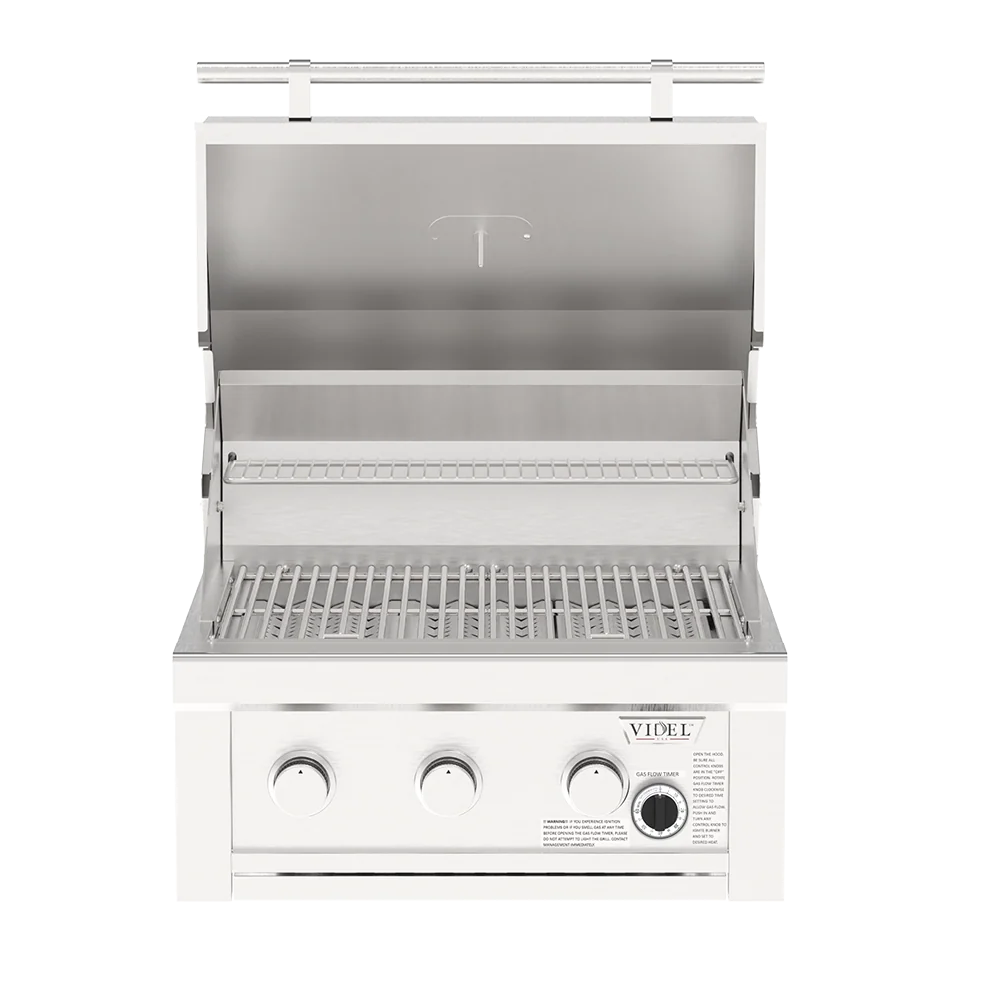 A stainless steel outdoor gas grill with the lid open, showing the grates and interior shelves. The front features three control knobs and a visible VIDEL brand label.